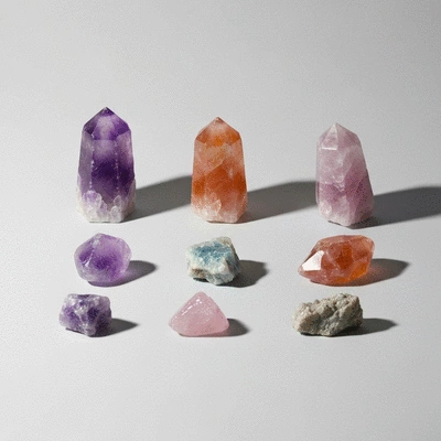 Assortment of colorful natural crystals on a light background